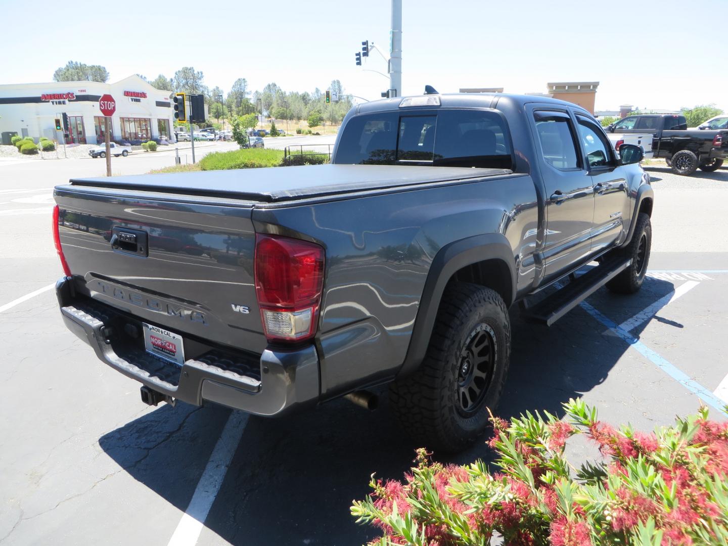 2017 CHARCOAL /GREY Toyota Tacoma TRD OFF-ROAD Double Cab Long Bed V6 6AT 4WD (3TMDZ5BN3HM) with an 3.5L V6 engine, automatic transmission, located at 2630 Grass Valley Highway, Auburn, CA, 95603, (530) 508-5100, 38.937893, -121.095482 - TRD Off-road Tacoma with a level kit, 17" Fuel Vector wheels, Falken Wildpeak AT tires, N-Fab running boards, Roll Up tonneau cover, BedRug, and window Deflectors. - Photo#4